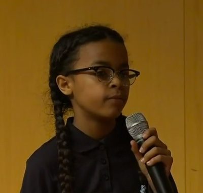 Female student with microphone