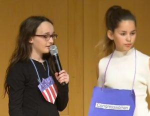 young female students answer judge's questions