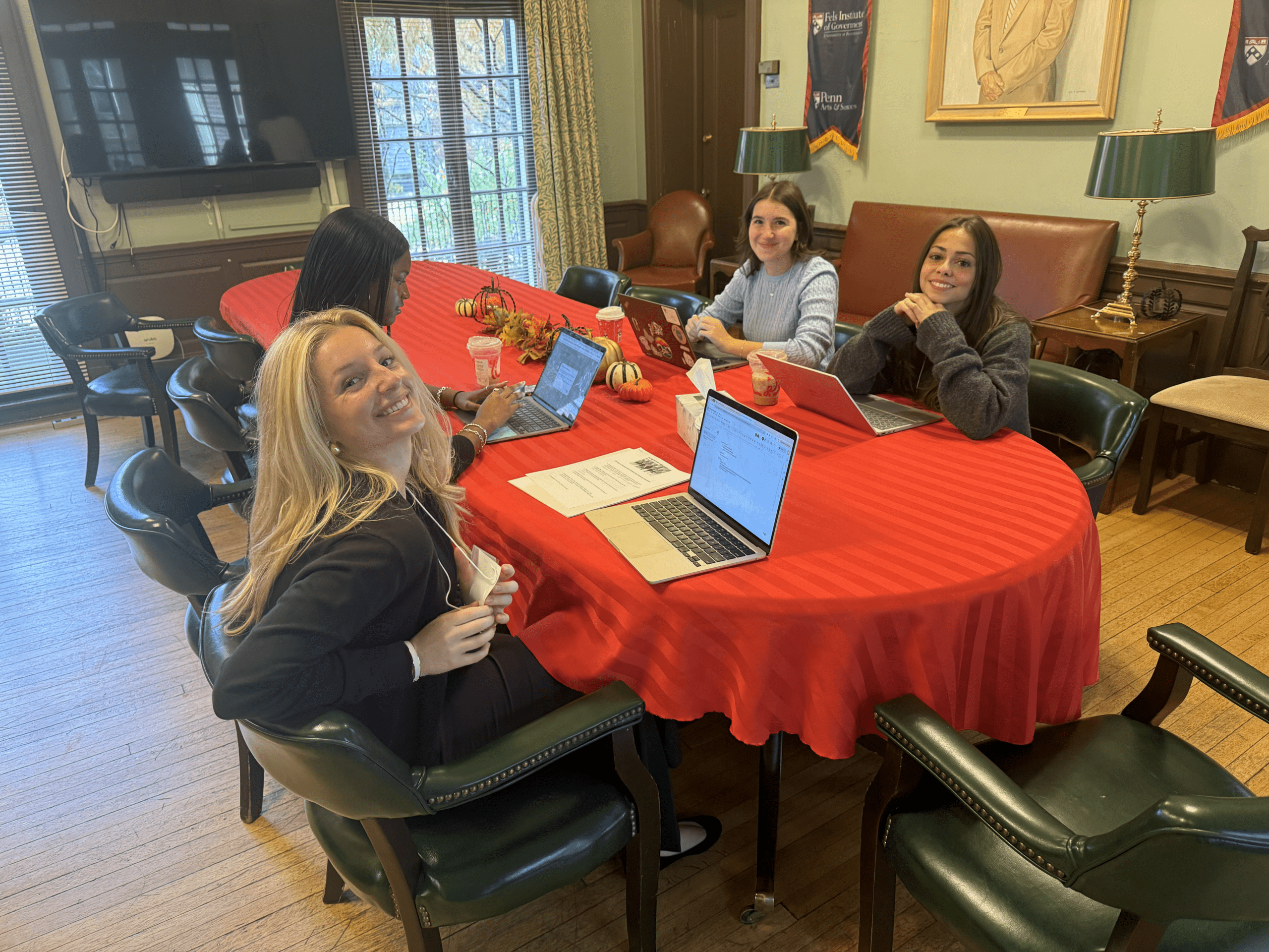 Group of students in front of their presentation