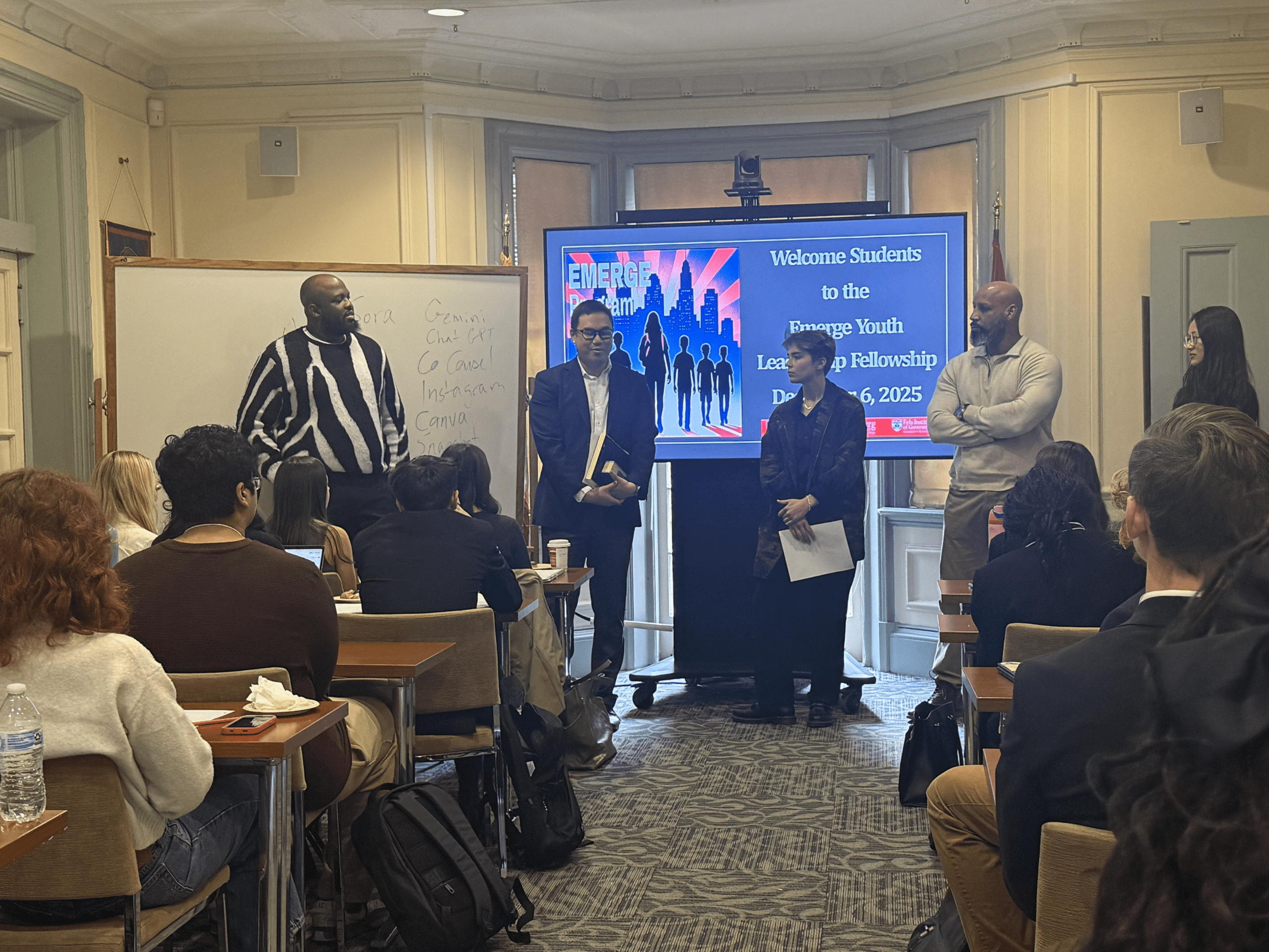 Group of students in front of their presentation